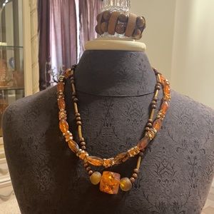 Necklaces and wooden bracelet with citrine faux stone. In great condition.